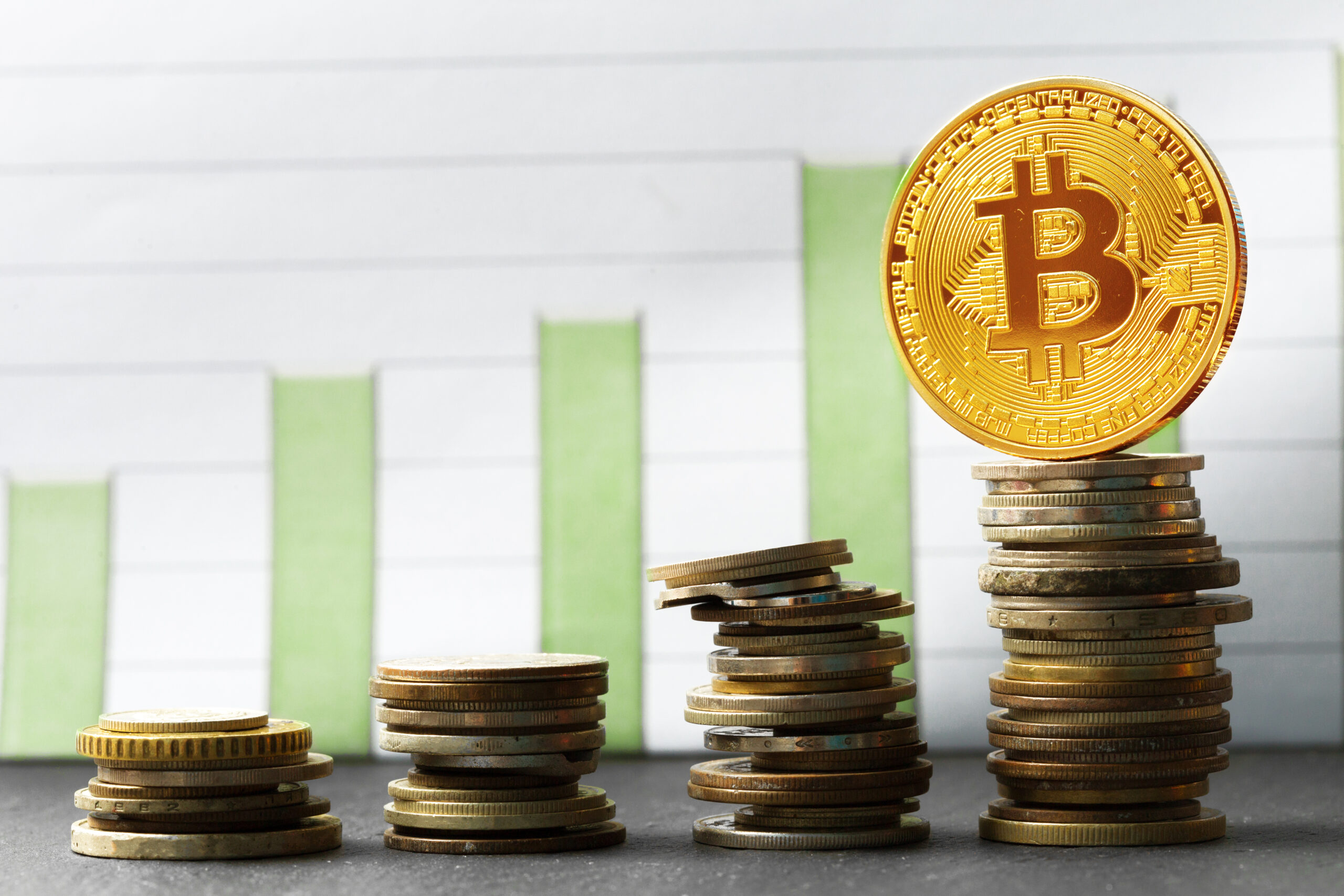 Bitcoin coin placed over stacked currency and rising bar chart, symbolizing digital asset growth amid global financial policy changes.
