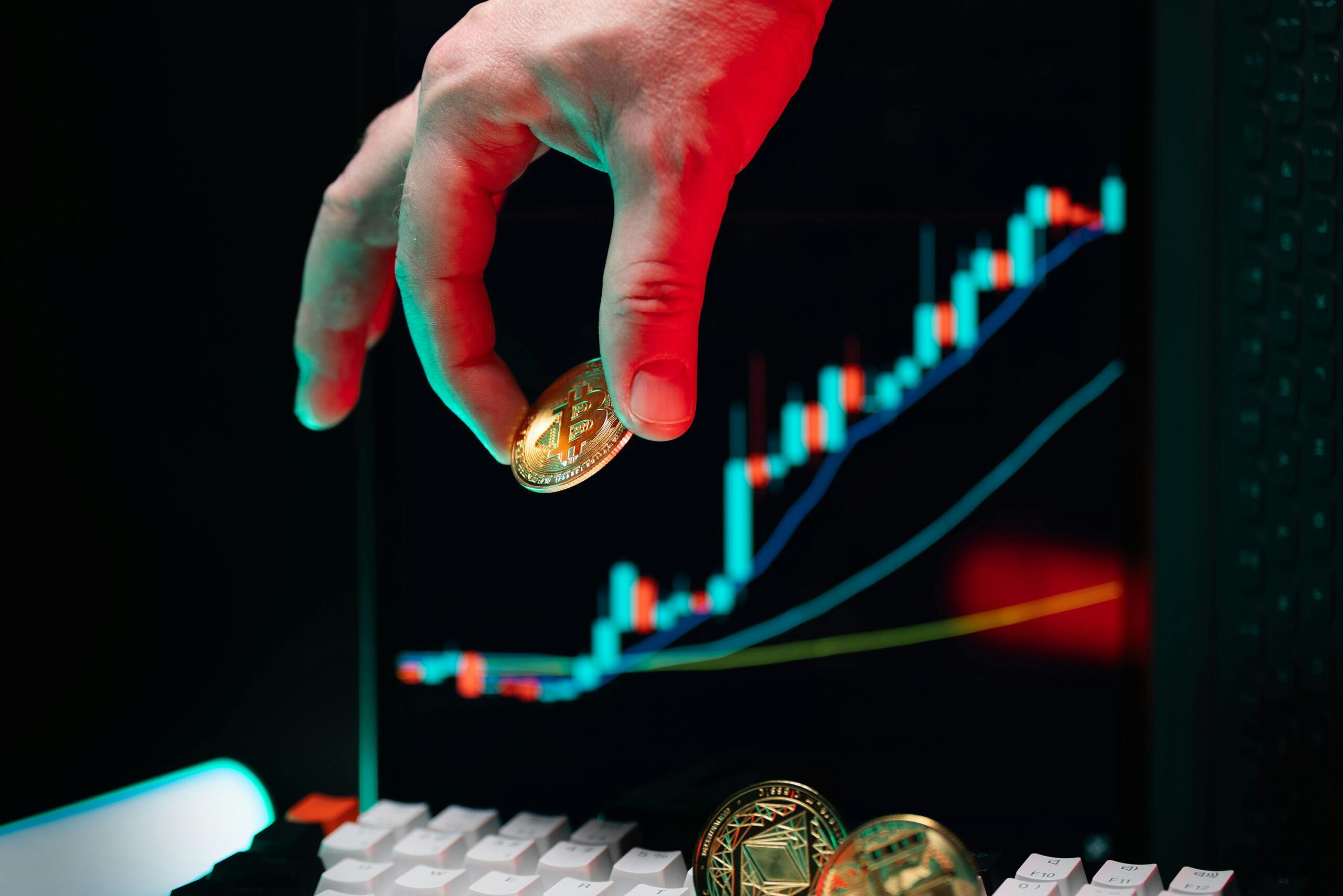 Hand pointing to an upward crypto price chart, suggesting bullish momentum and possible XRP breakout.