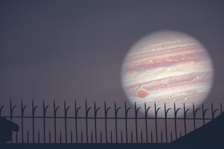 Jupiter token price chart showing a 100% spike to $0.61 with Uniswap logo in the distance, hinting at a competitive faceoff in the DeFi space.