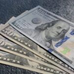 Genesis filing lawsuit documents against DCG and Barry Silbert, with imagery of a collapsing crypto lender and bold “Fraud” stamp over court papers.
