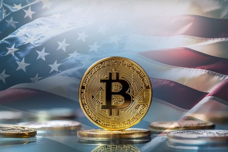 A golden Bitcoin coin overlaid with KindlyMD and Nakamoto Holdings logos, symbolizing a strategic merger in the healthcare and blockchain space.
